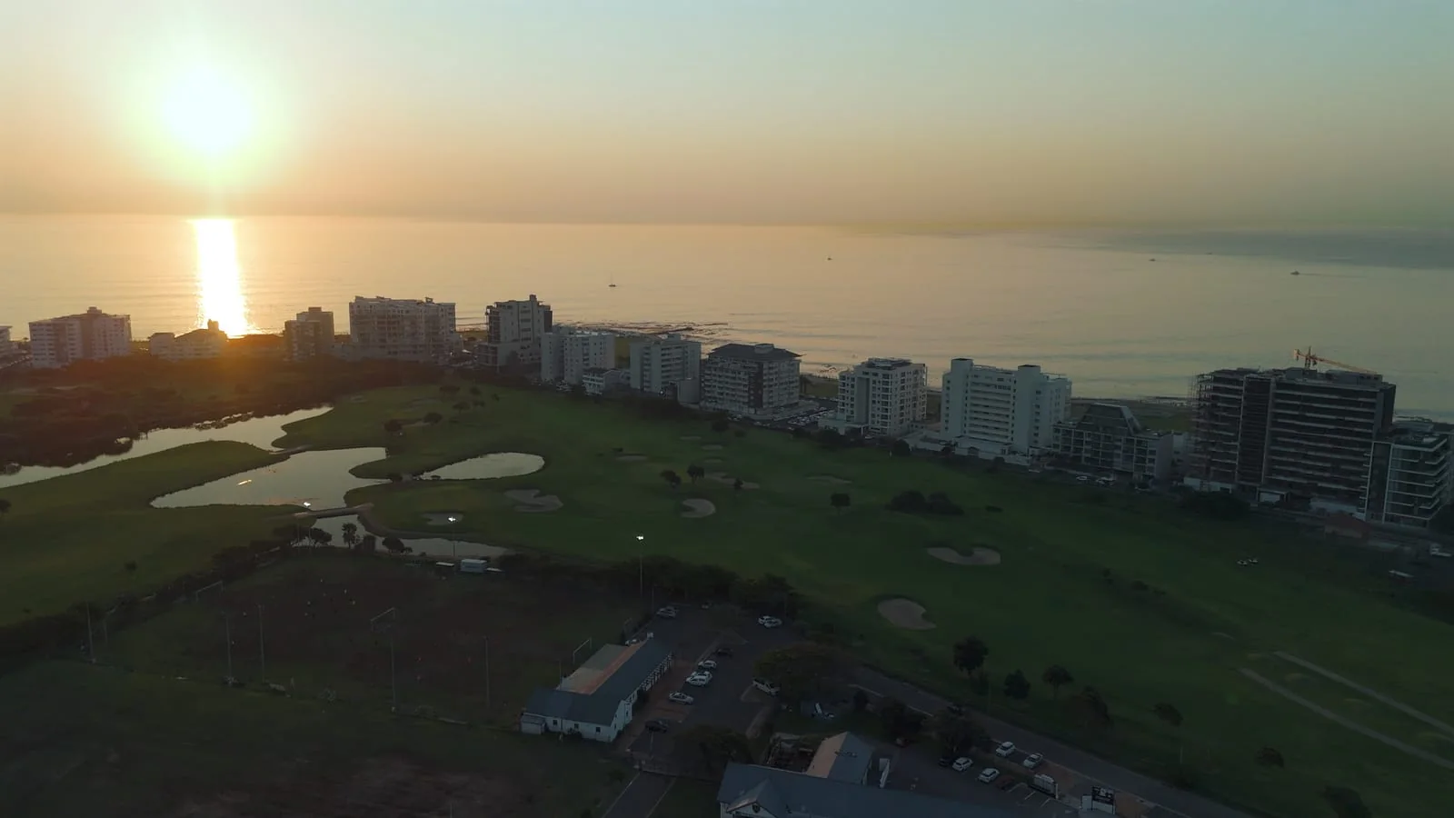 Sunset over the sea, from above the course